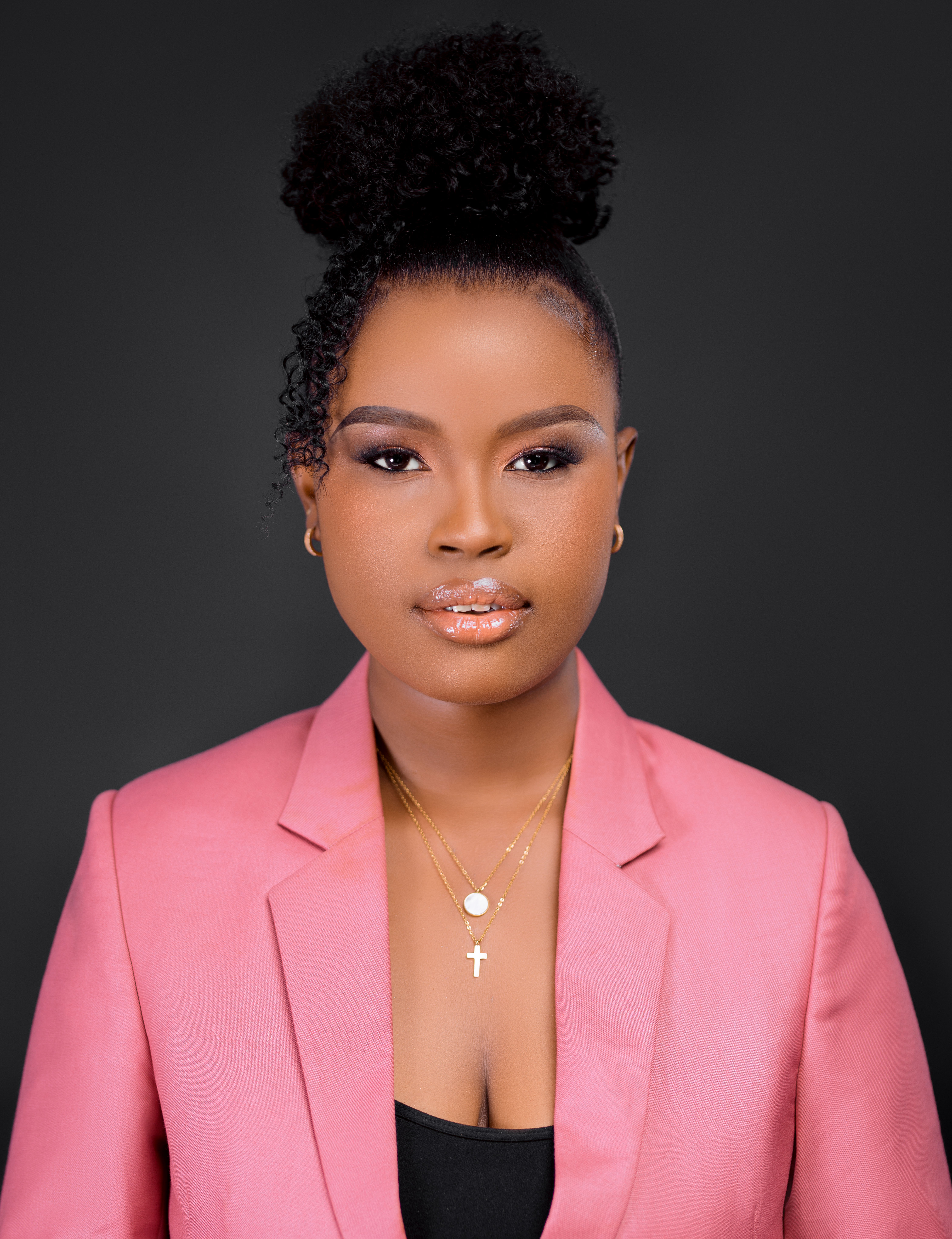 Lilian Marco wearing a pink coat